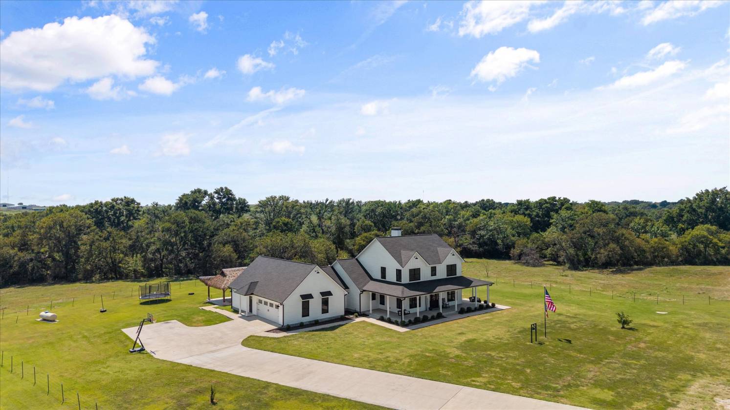 Gorgeous Farmhouse on 38+ Acres w/ Creek and Pond - photo 1