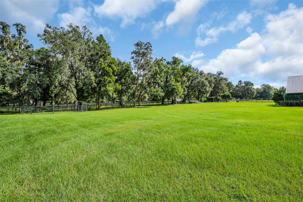 10.58-Acre Horse Farm with a 7 Stall Block Barn! - photo 20