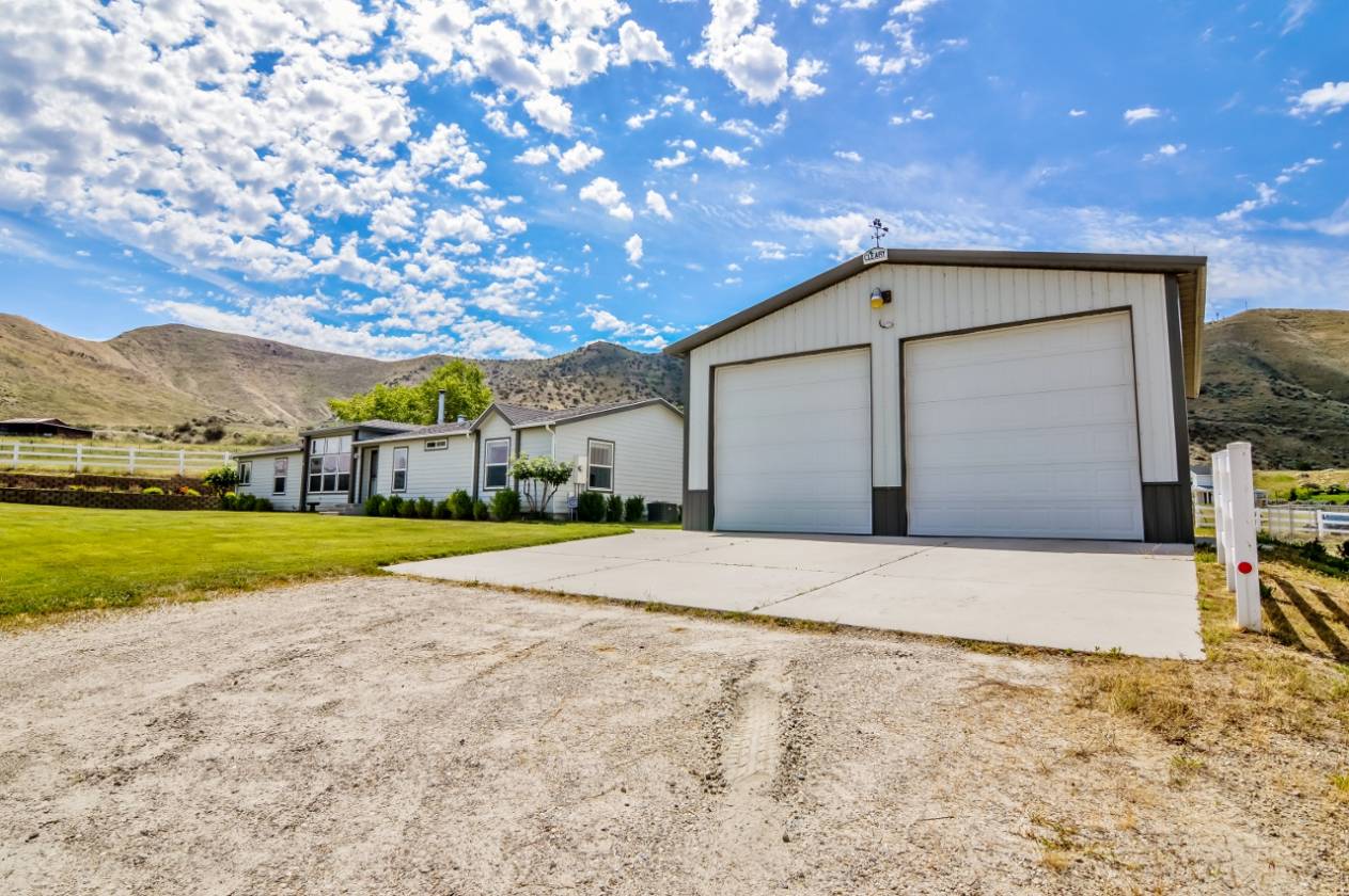 Immaculately maintained house on 5 fully fenced acres. No HOA