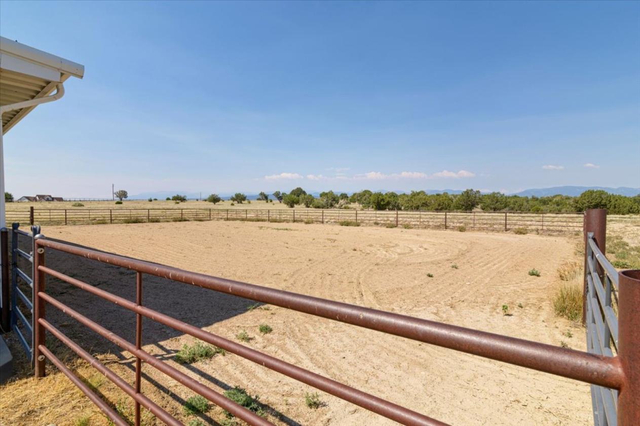 Pueblo ranch with 27,125 sq ft building - photo 25