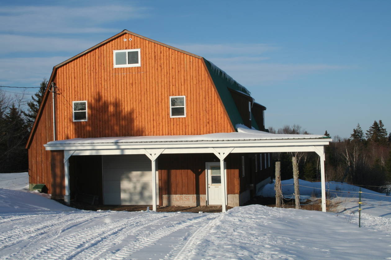 horse farm on lake with 4 houses and 2 barns New Horton, Albert