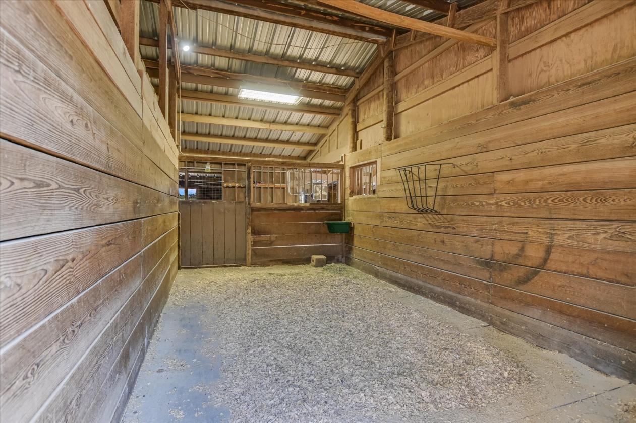 8.55 ACRES + REMODELED HOME + 8 STALL BARN - photo 17