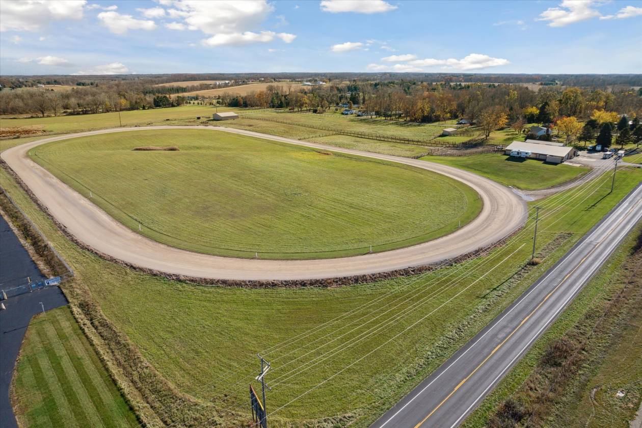 60 Acre Horse Farm with 1/2 Mile Track & 35 Stalls - photo 5
