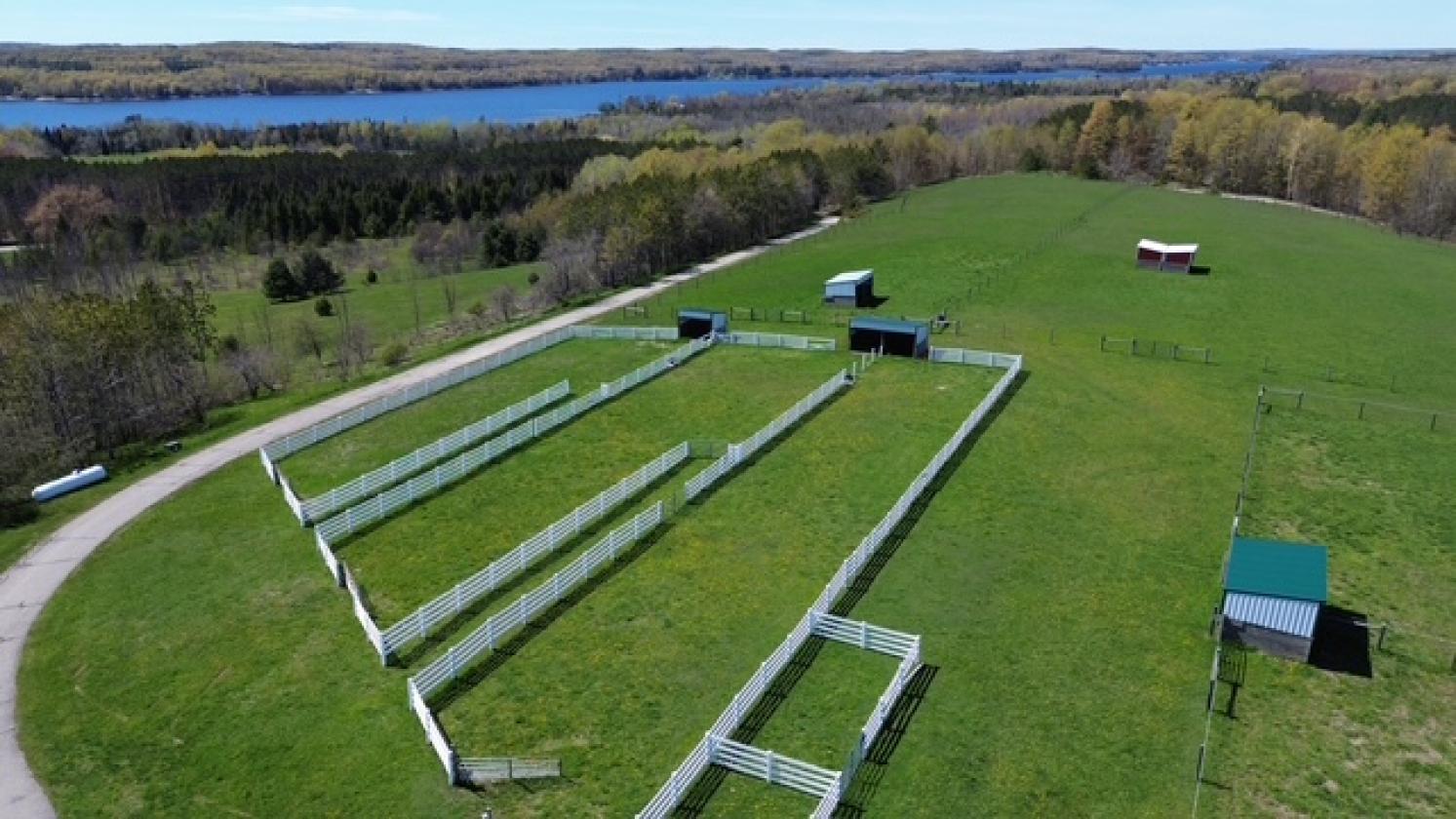 180 ACRE EQUESTRIAN ESTATE WITH PRIVATE LAKE! - photo 8