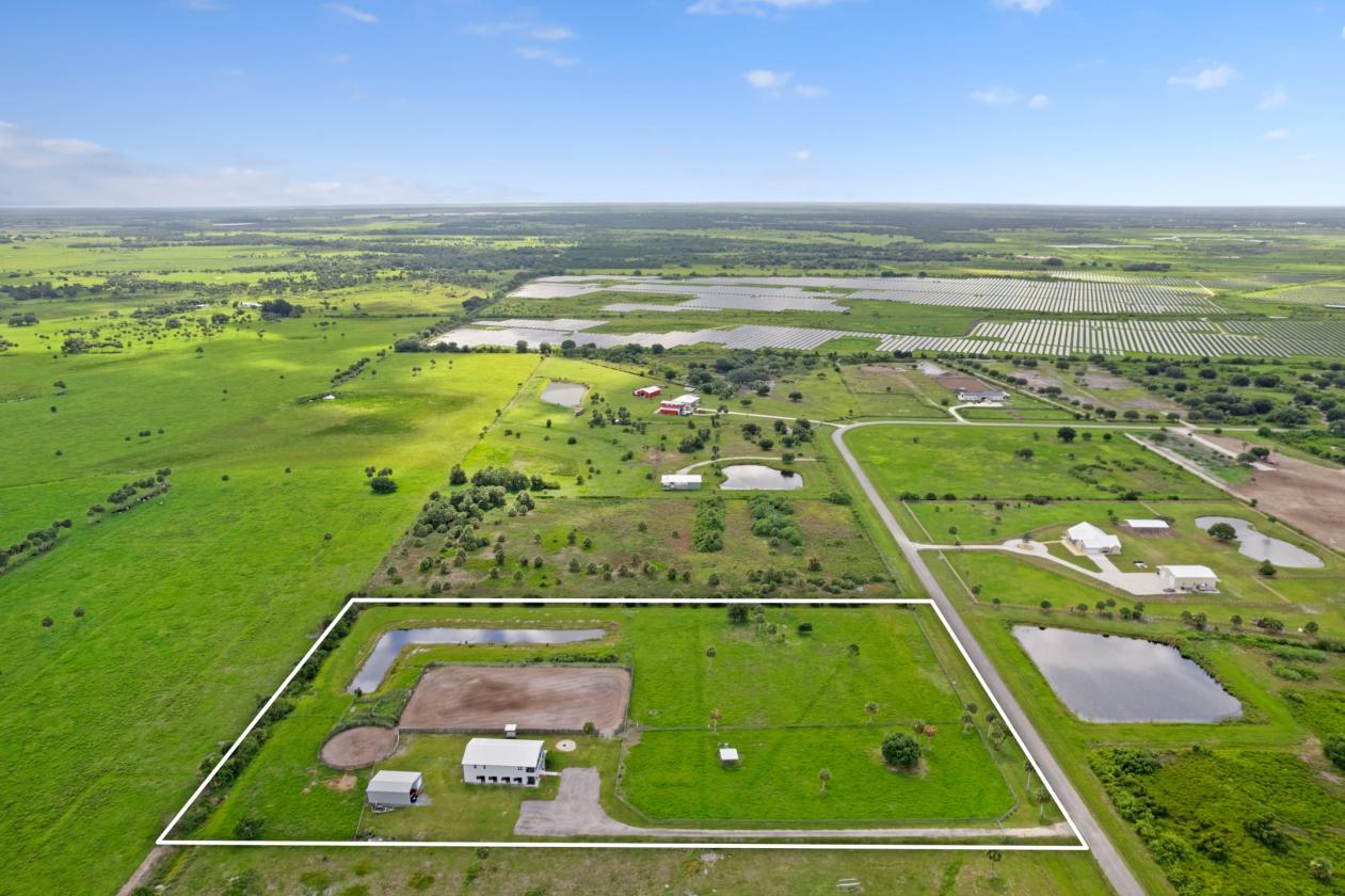 8 STALLS  •  8+ ACRES • ARENA • TURNKEY HOME - photo 2