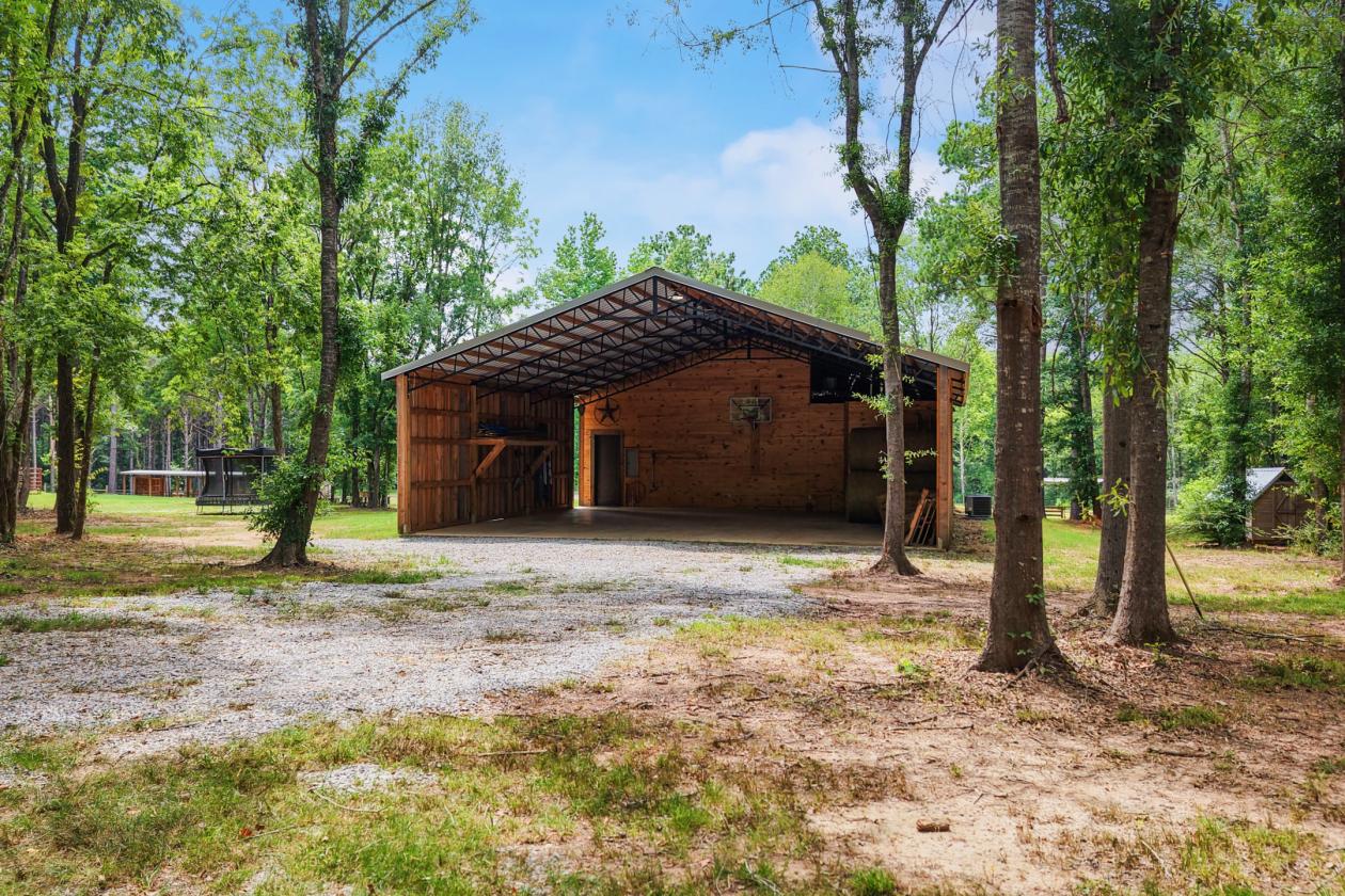 89.99 acre horse farm with lighted arena & more - photo 28