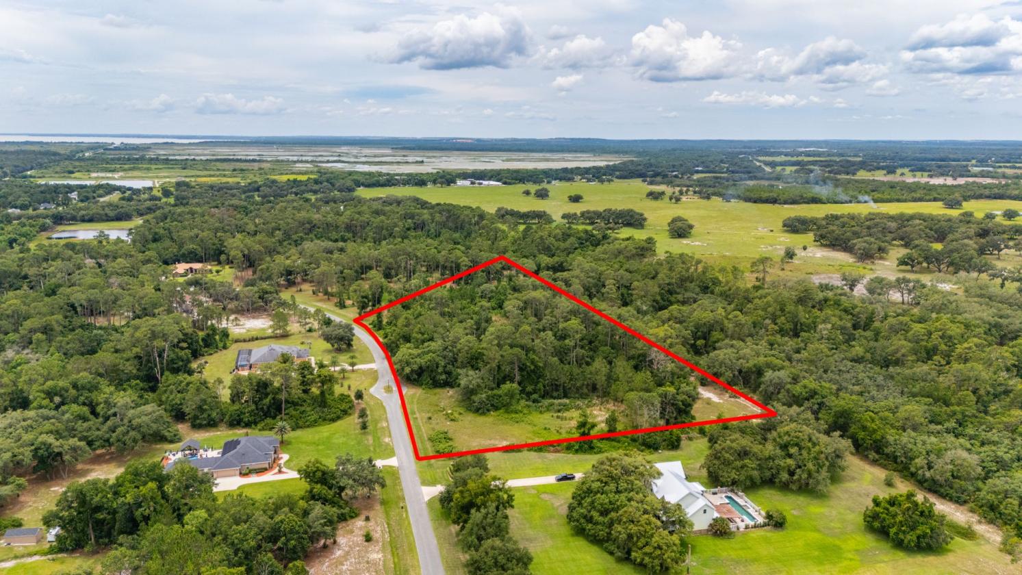 Beautiful Lot located in a gated Equestrian Area - photo 7