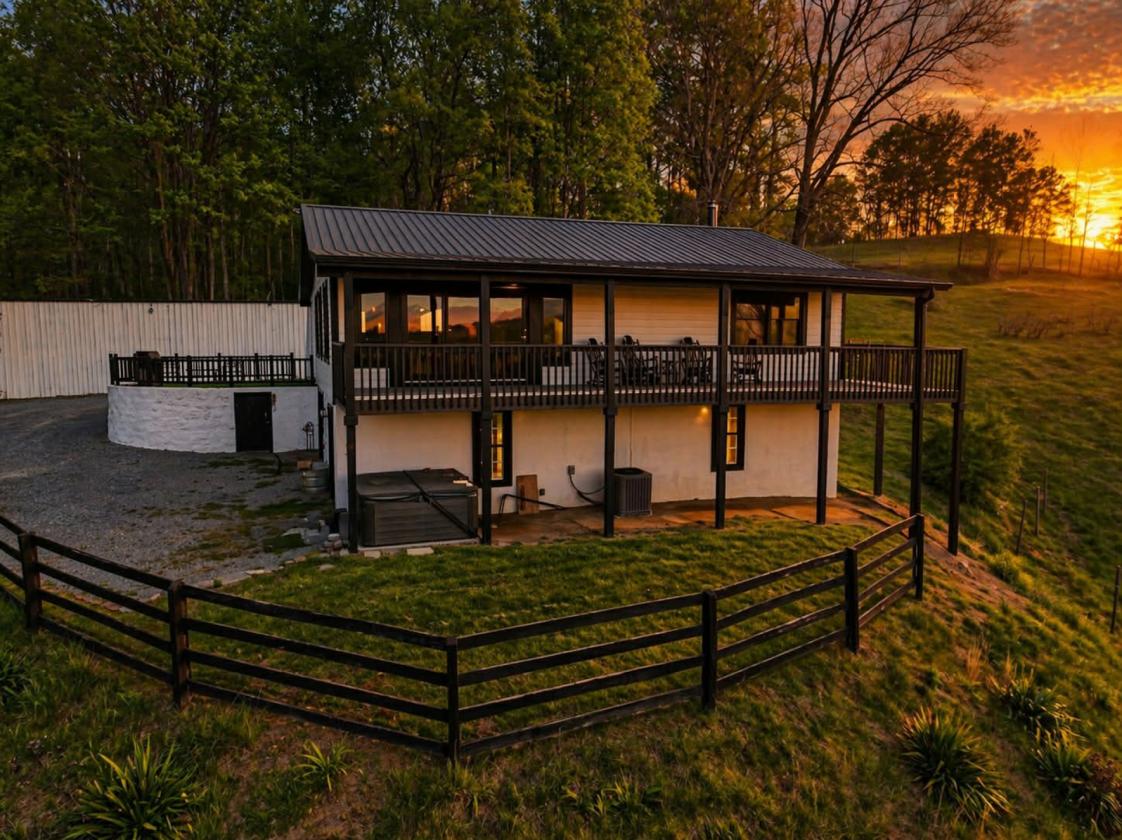 10 acres, multiple barns & homes, farm pond - photo 1