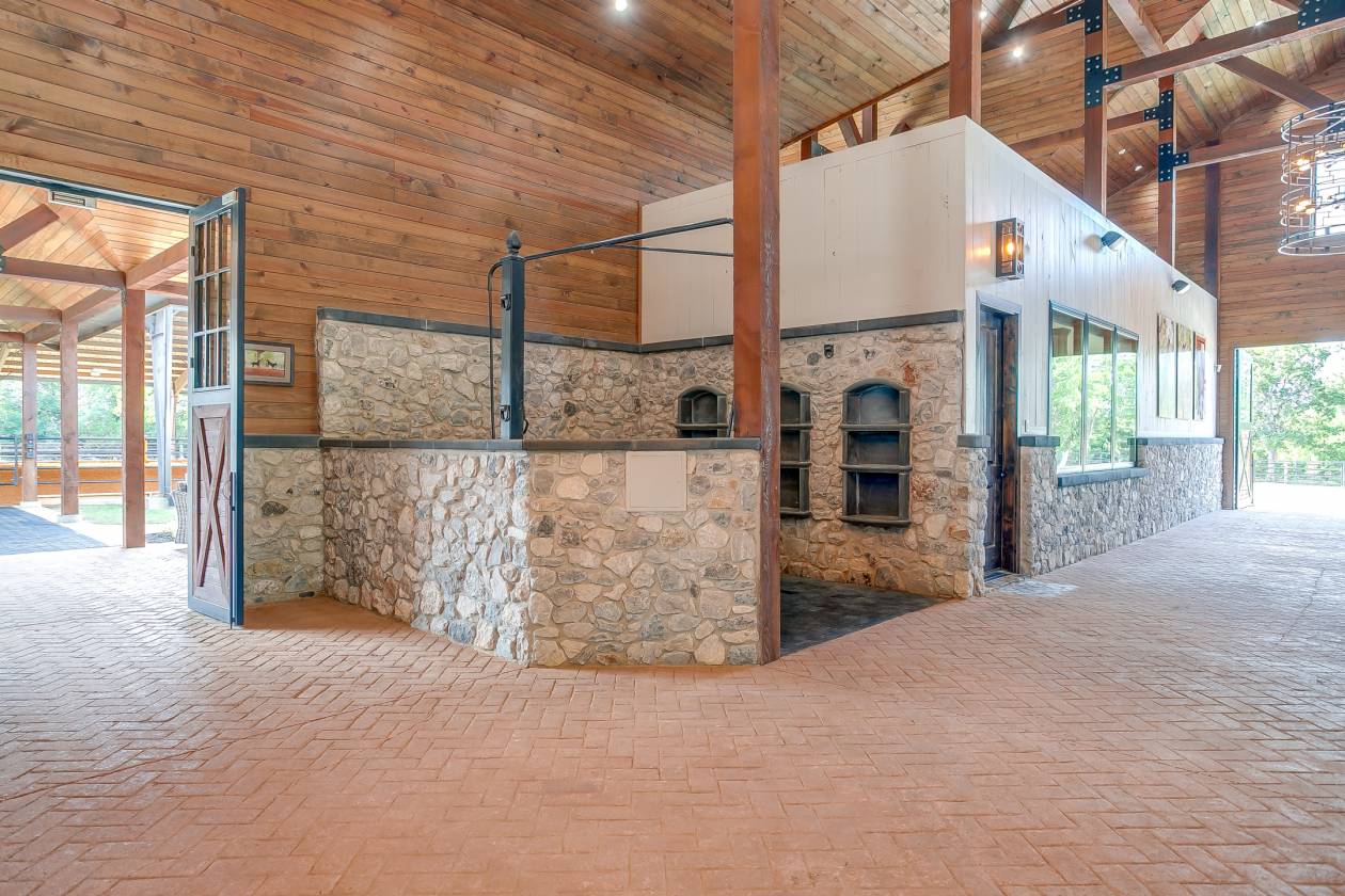 TK Trails | 8-Stall Barn | Covered Arena - photo 9