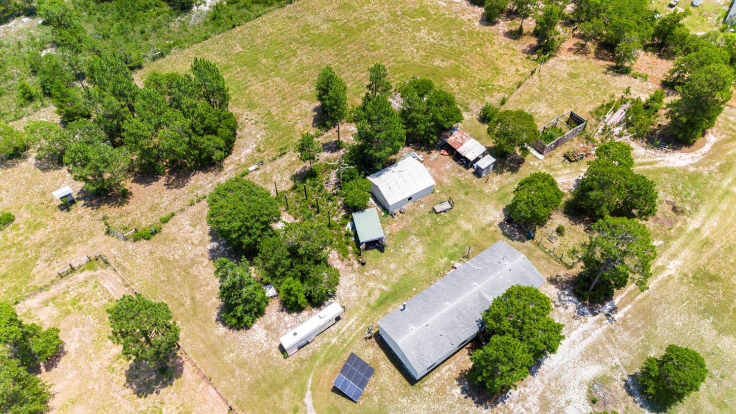 21.65 flat acres with large home and paddocks - photo 13