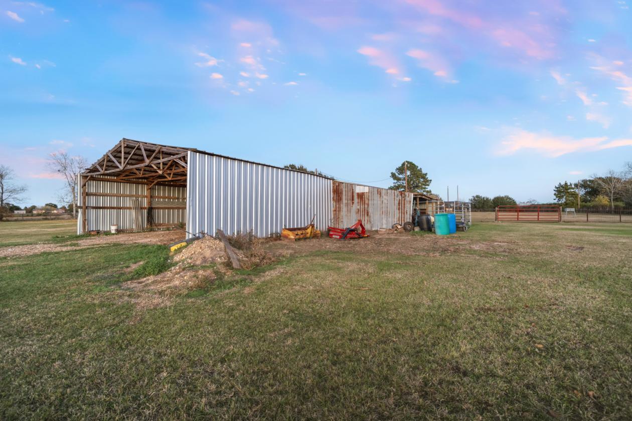 5+ Acres | Multiple Barns & Outbuildings + Home - photo 9