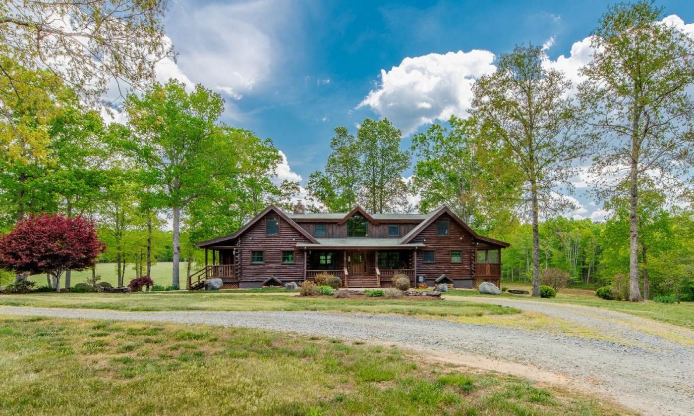 243-Acre Horse Farm w/ Log Home & Stable - photo 1