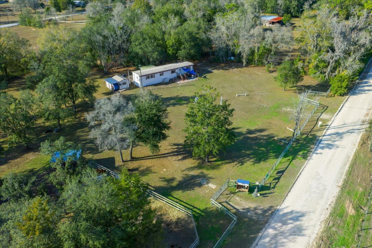 2.5 Acres of Mini Farm Living + Income Potential! - photo 23