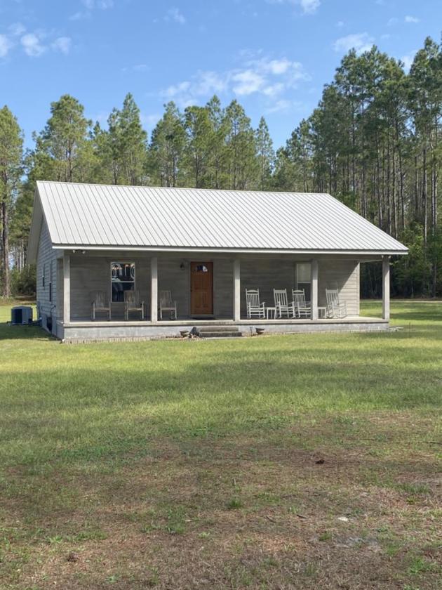 20 ACRE BEAUTIFULLY WOODED HOMESTEAD - photo 28