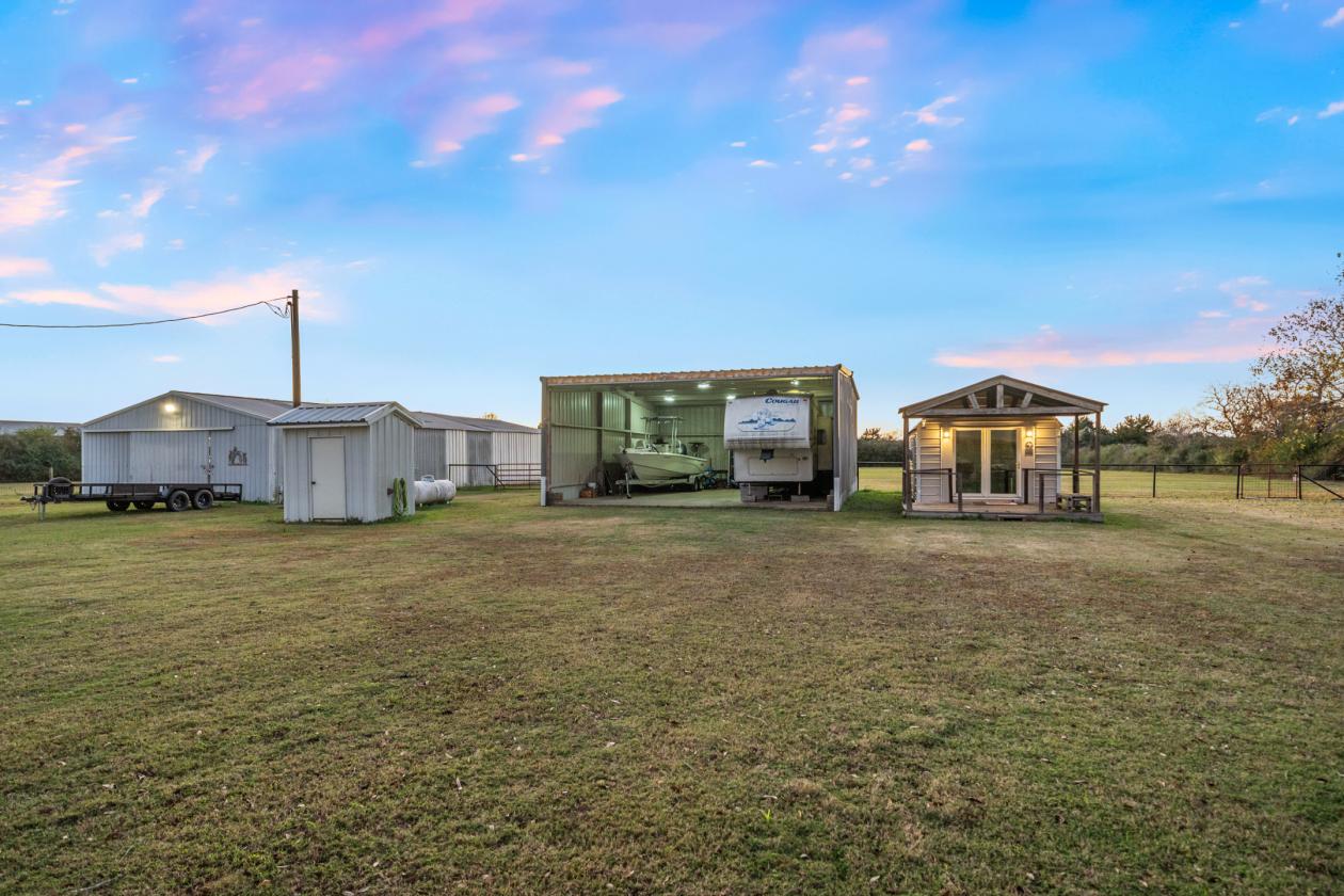 5+ Acres | Multiple Barns & Outbuildings + Home - photo 4
