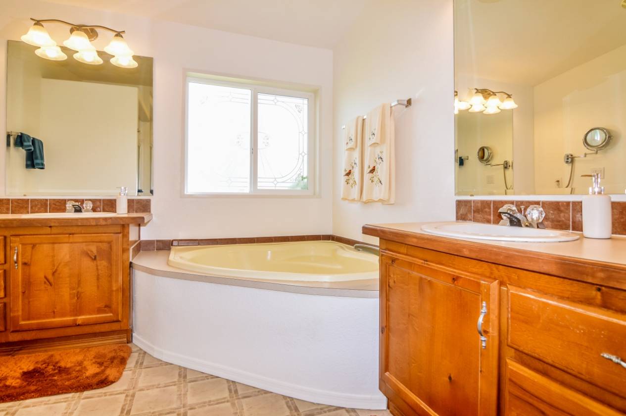 Immaculately maintained house on 5 fully fenced acres. No HOA