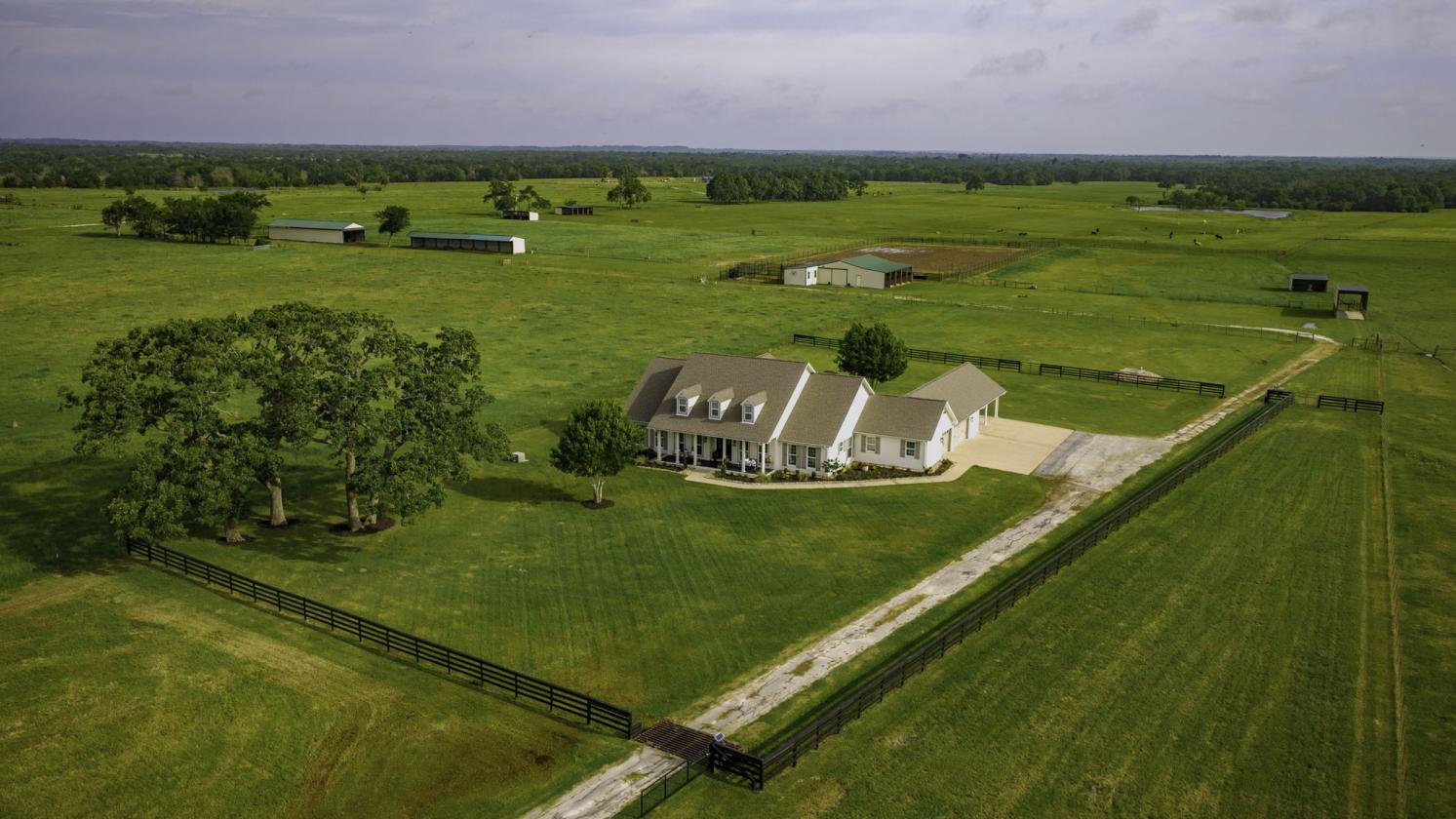 Premier Property with Luxury Home, Barn, and Arena - photo 2