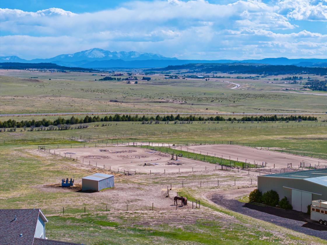 36 Breathtaking Acres w/ 15 Stalls & 3 Arenas - photo 21