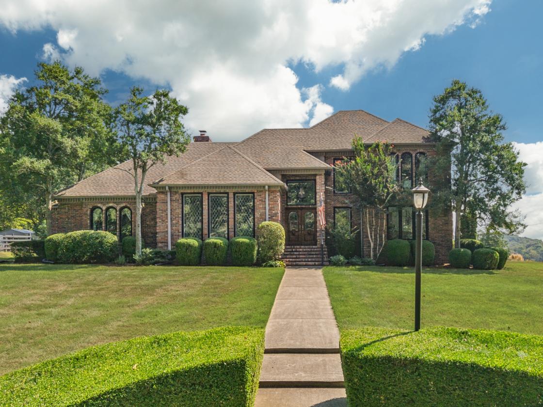 Executive-style home on 11+ acres in Elkmont, AL - photo 1