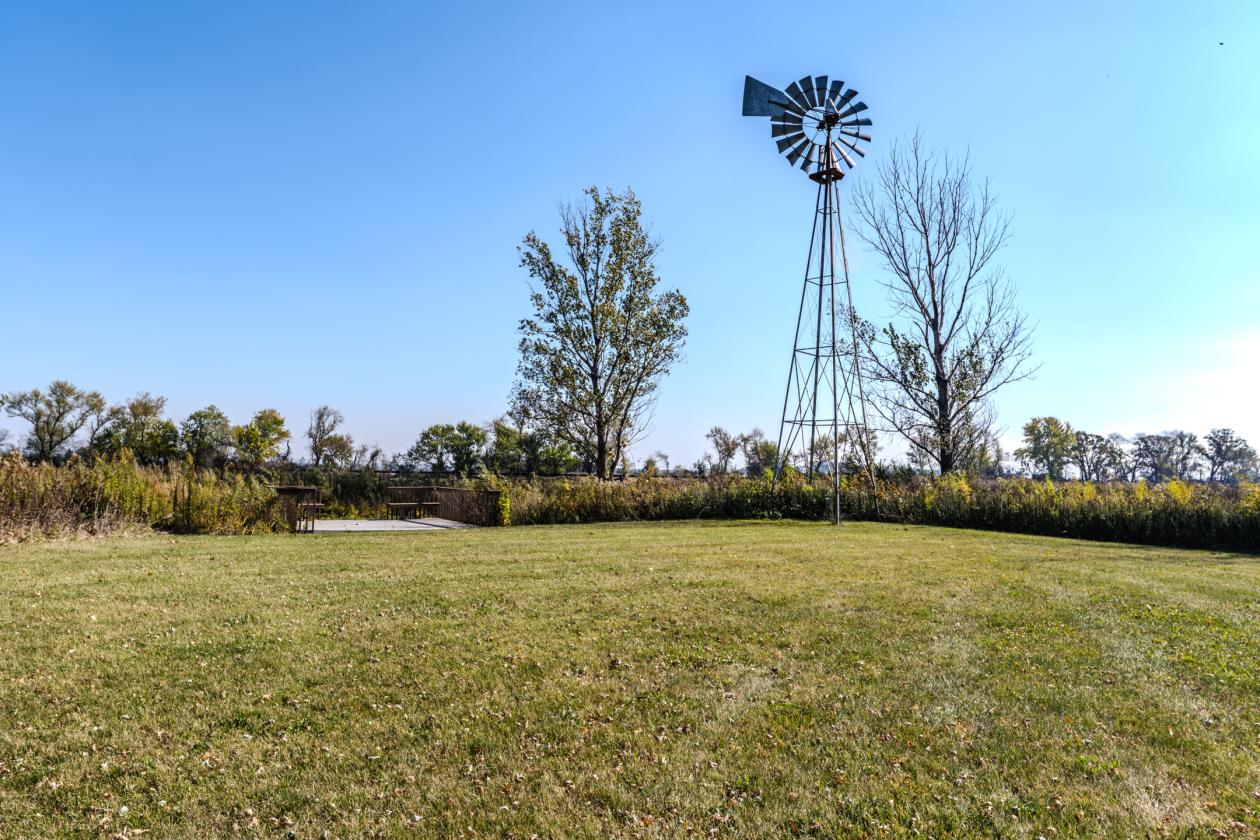 ENJOY EQUESTRIAN LIVING ON THIS BREATHTAKING FARM - photo 7