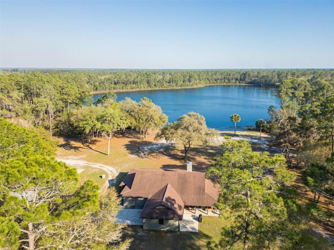 10 Acre Lakefront Estate w. 400k acre Trail Access - photo 2