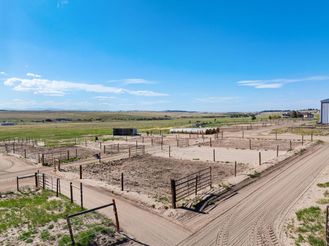 36 Breathtaking Acres w/ 15 Stalls & 3 Arenas - photo 23
