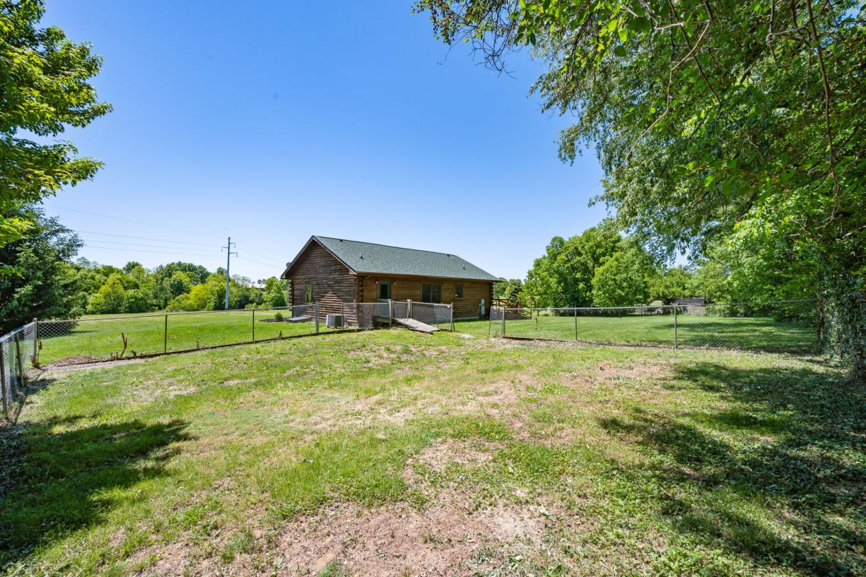 Log cabin nestled on 8.2 picturesque acres - photo 28