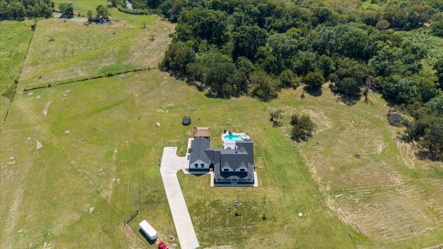 Gorgeous Farmhouse on 38+ Acres w/ Creek and Pond - photo 8