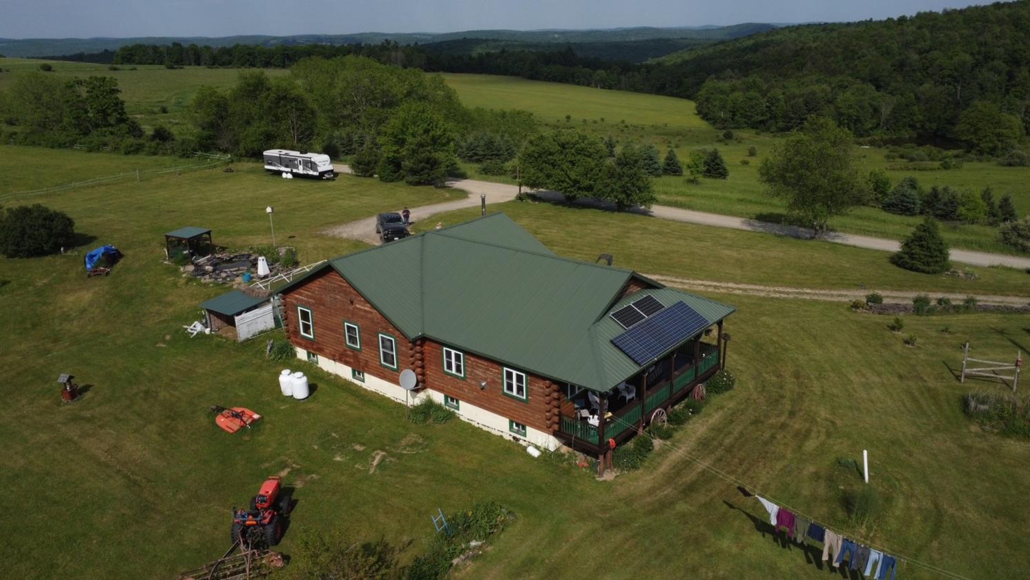 Log Home with 52 acres, barns, spectacular views - photo 1