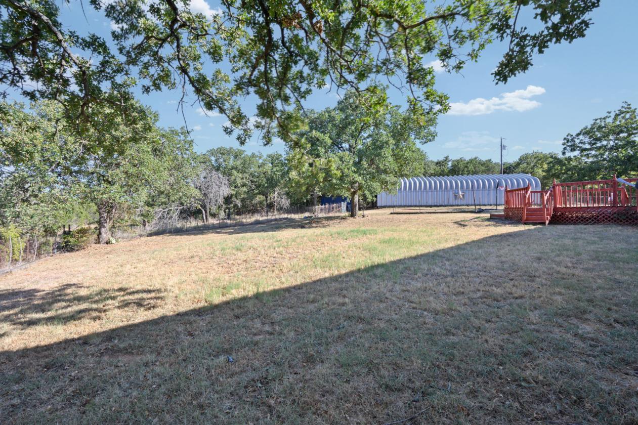 AG EXEMPT, NEARLY 7 ACRES, PLENTY OF GRASS! - photo 10