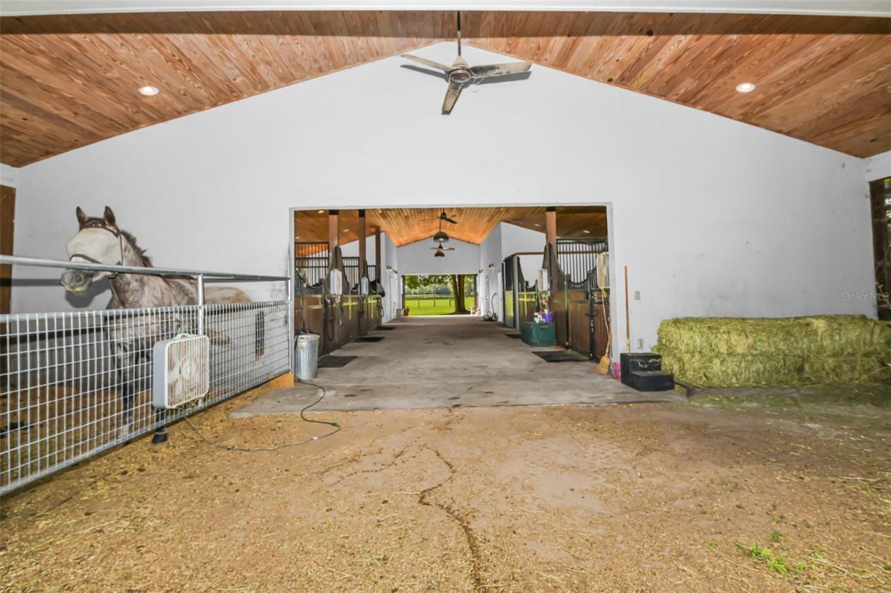 10.58-Acre Horse Farm with a 7 Stall Block Barn! - photo 12