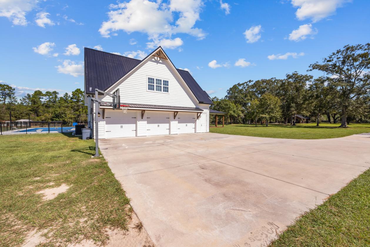 Modern Farmhouse with 3 Stall Barn on 20 Acres - photo 25