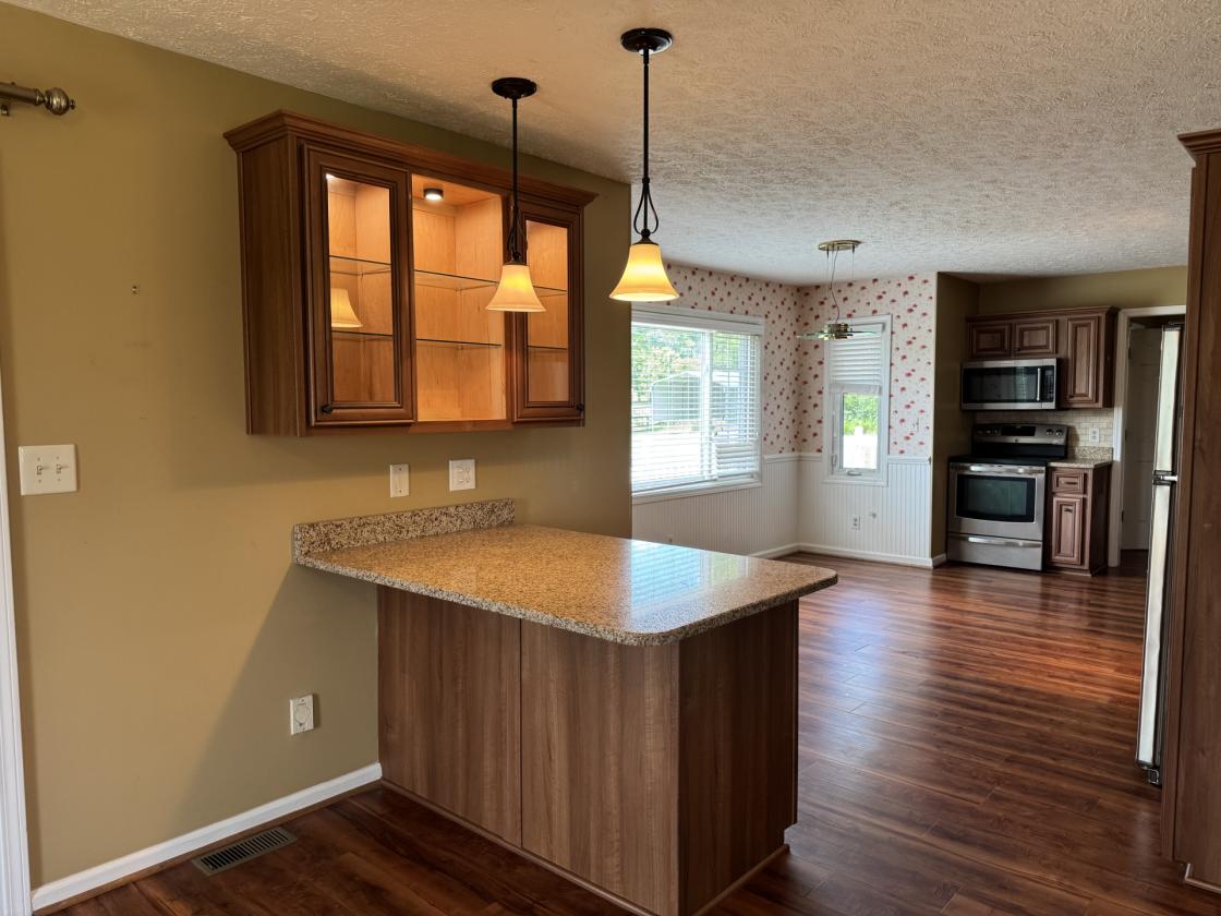 Beautiful home with Barn & Pond and fenced acreage - photo 15