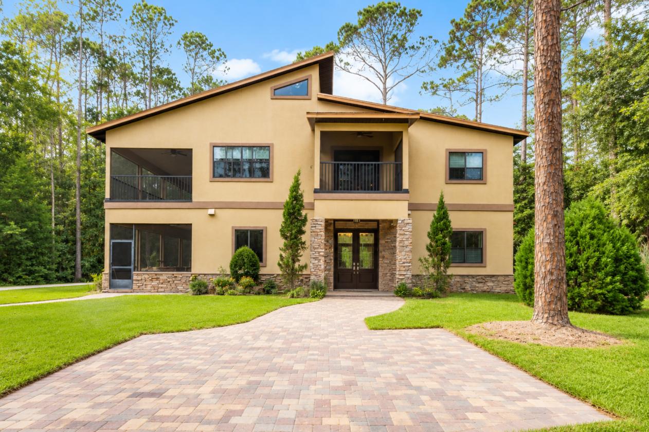 Luxury lake estate with acreage and horse stalls - photo 1