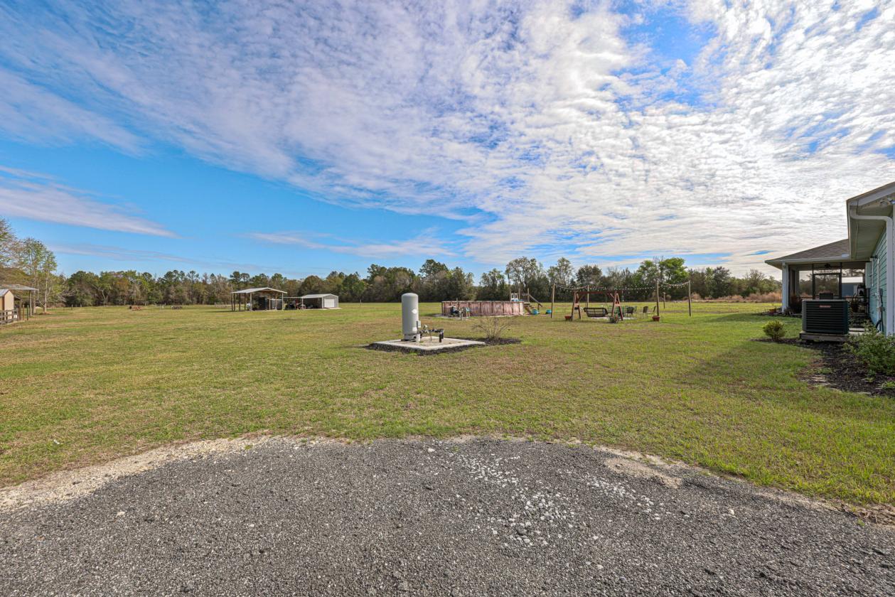 5 Acres | Custom Home, Pole Barn, RV Parking - photo 6