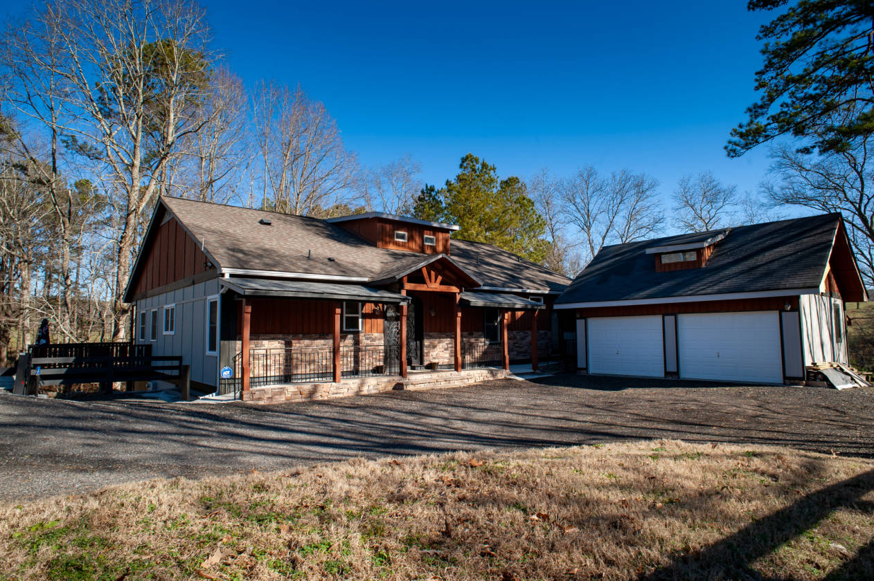 Custom built home and beautifully constructed barn on acreage Cumming