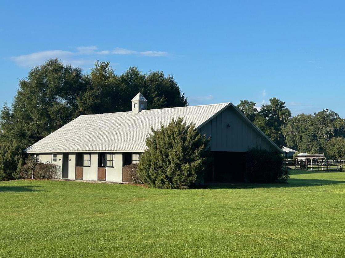 10.58-Acre Horse Farm with a 7 Stall Block Barn! - photo 14