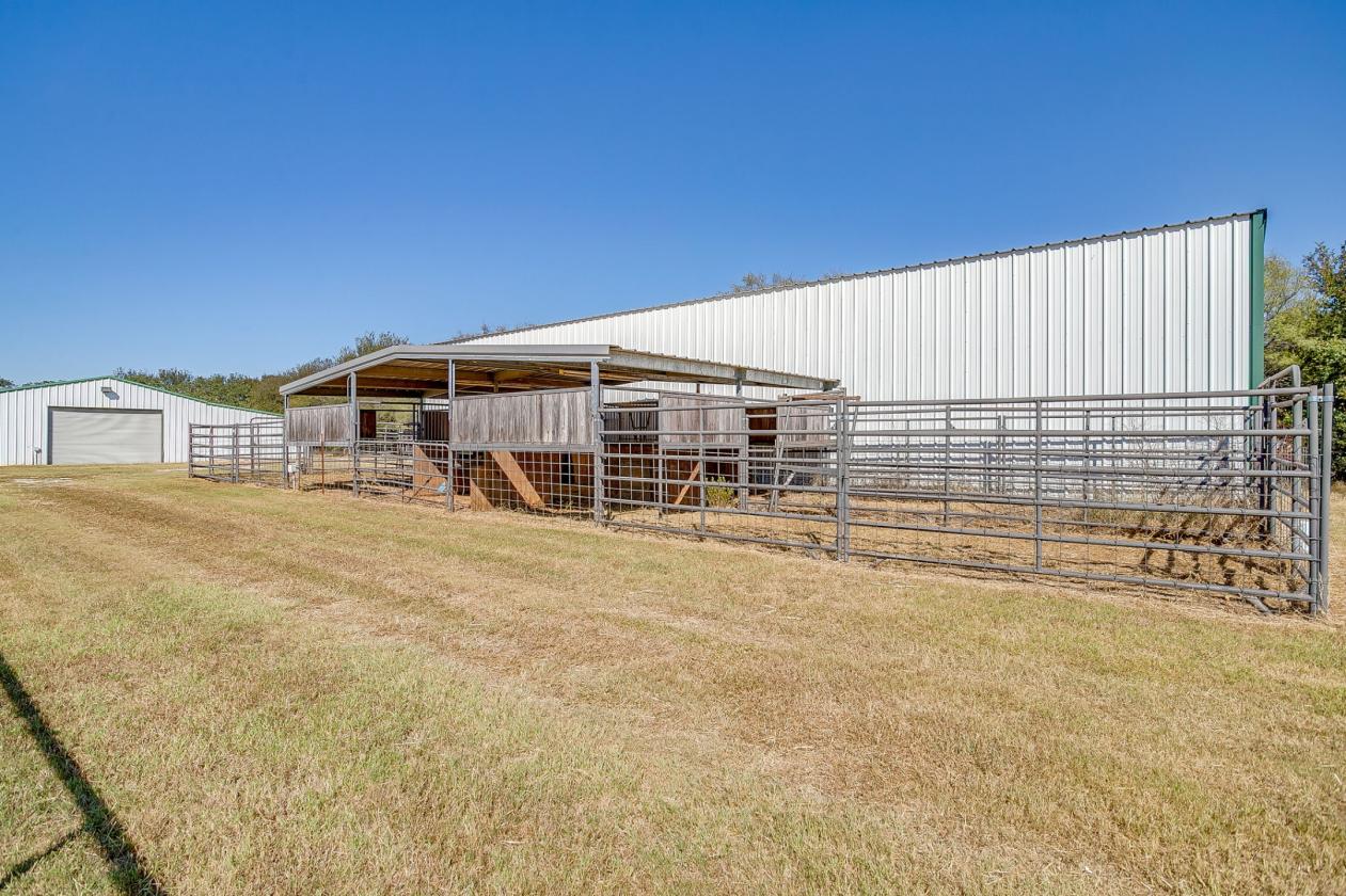 15+ ACRES W/ HOME, BARN, SHOP, AND COASTAL HAY - photo 10