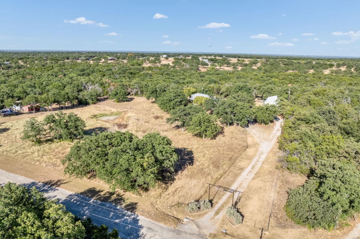 AG EXEMPT, NEARLY 7 ACRES, PLENTY OF GRASS! - photo 8