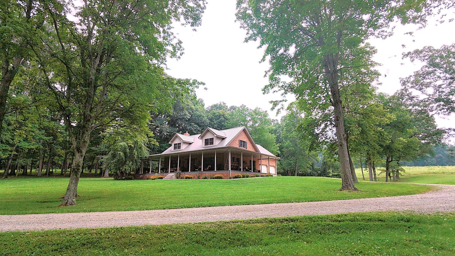 31 LEVEL ACRES w/HOME, BARN, 4 CAR GARAGE - photo 1