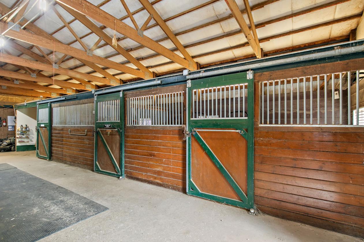5.25 Acres + Ranch Home + 13 Stalls & Indoor Arena - photo 11