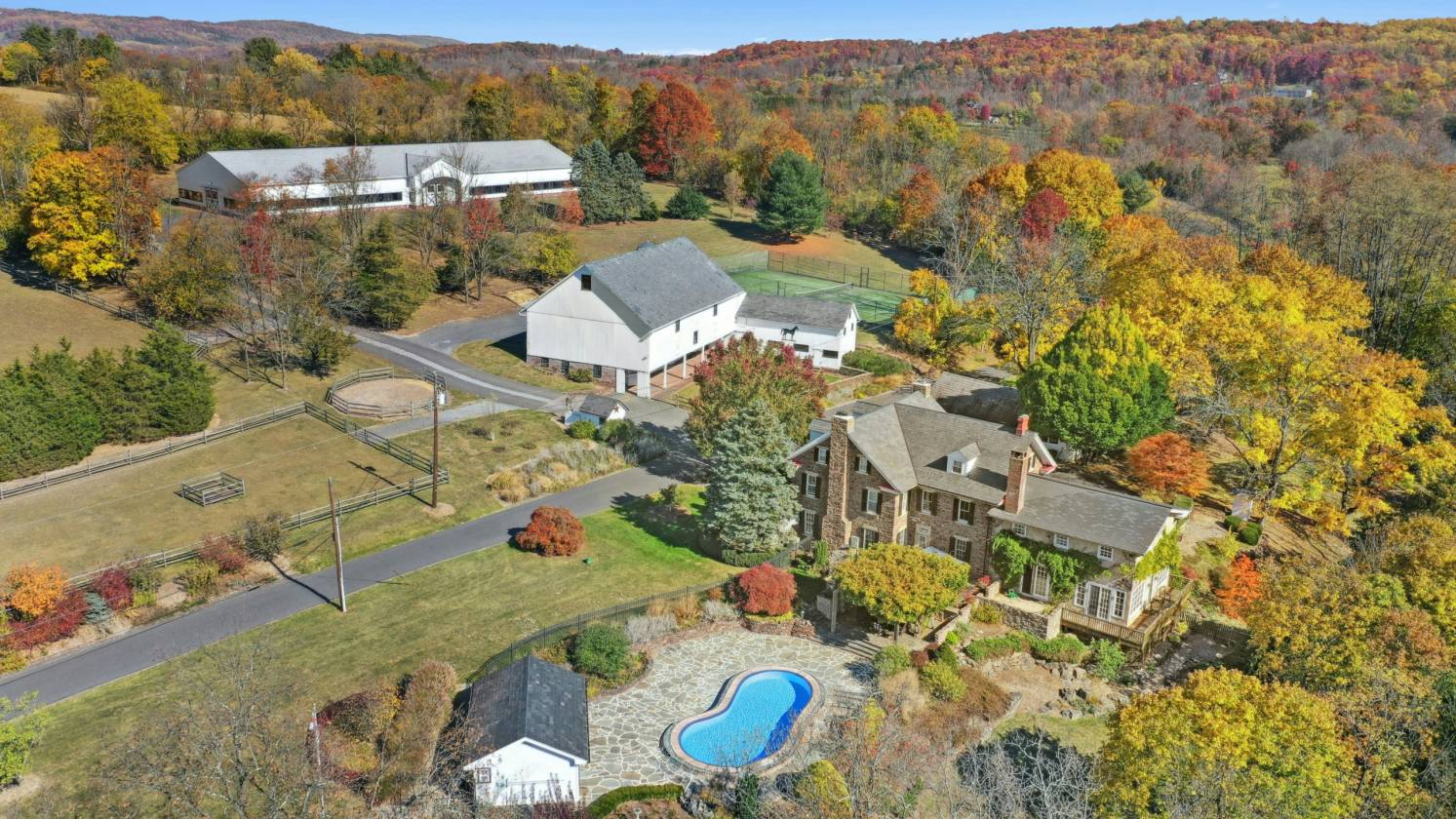 Expansive 58-Acre Property with Stable & Arena - photo 1
