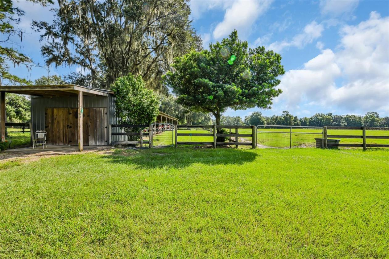 10.58-Acre Horse Farm with a 7 Stall Block Barn! - photo 16