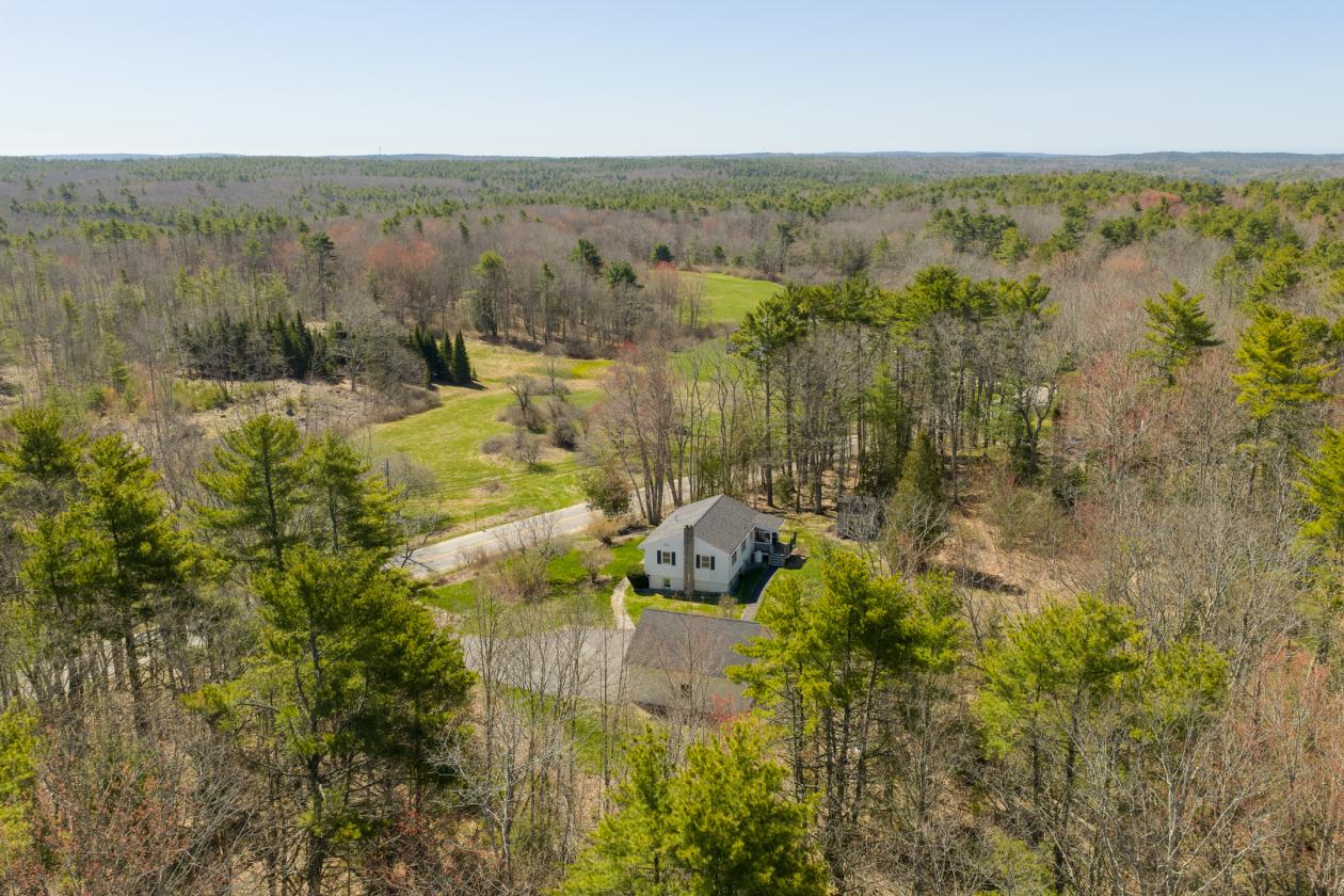 Split level ranch on 10 wooded acres in West Bath - photo 1