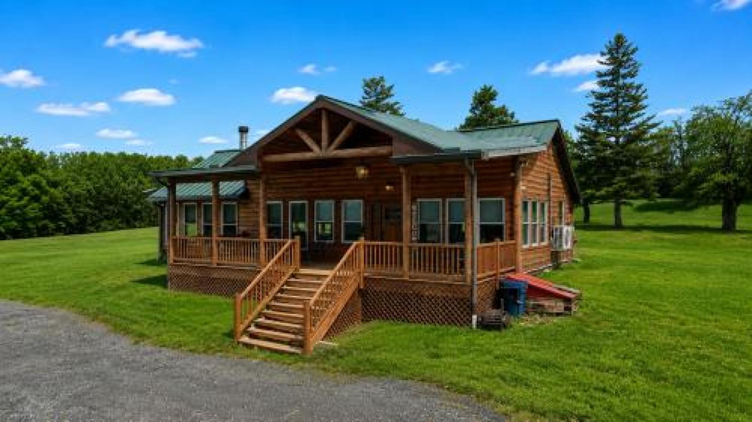 HUGE PRICE DROP! 69+ acres with renovated cabin - photo 1