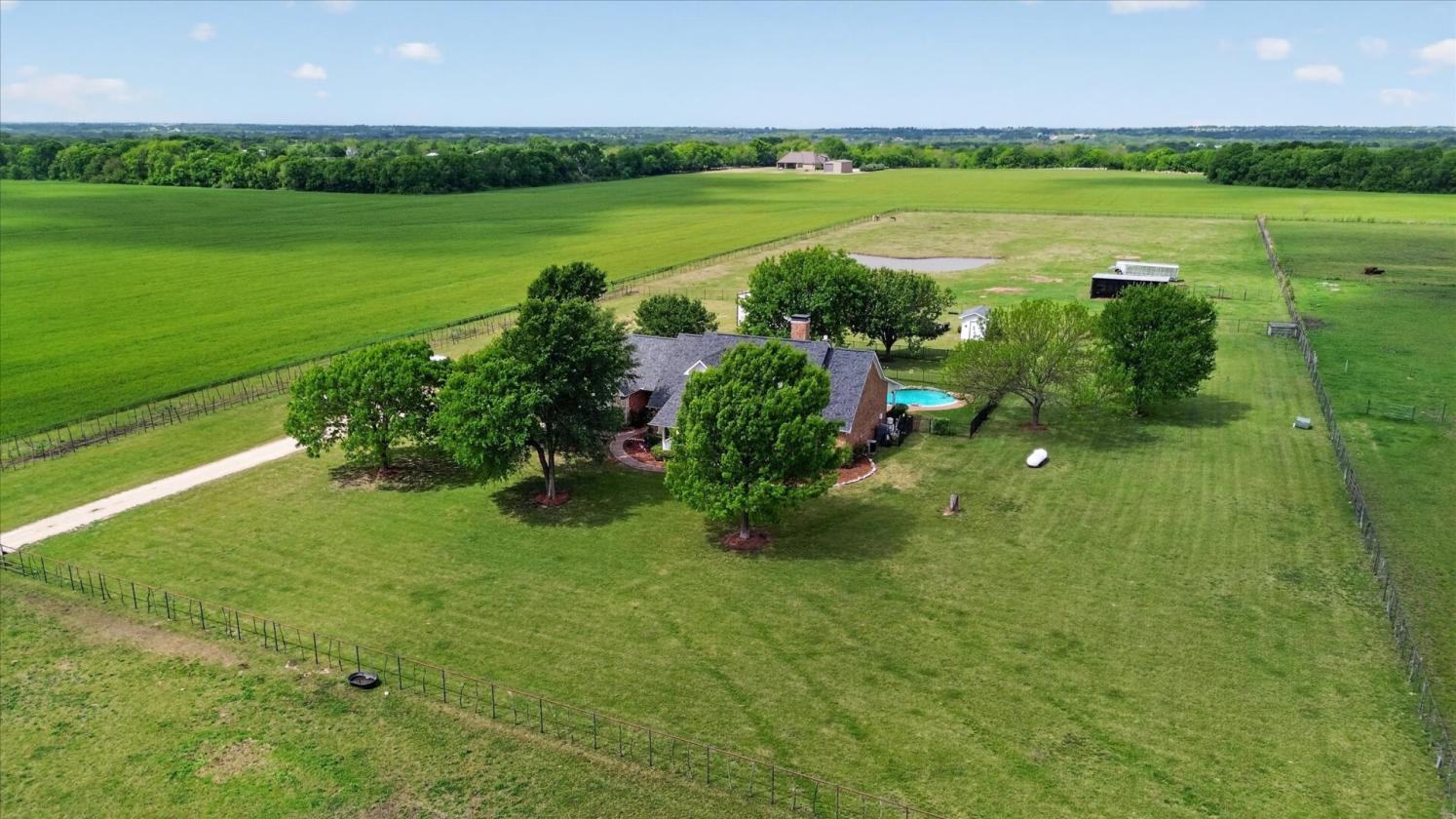 Lovely home with Pool on 9+/- AC Fully Pipe Fenced - photo 1
