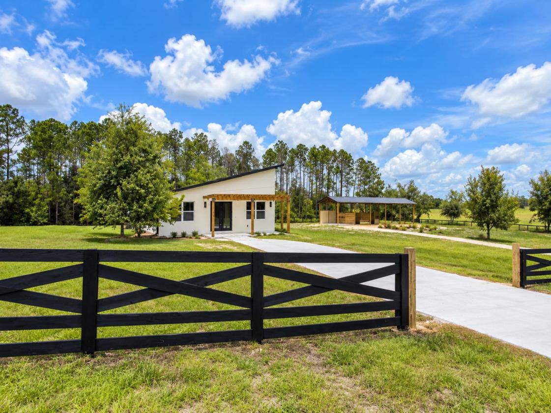 MODERN EQUESTRIAN RETREAT WITH SWEEPING PASTURE VI - photo 1