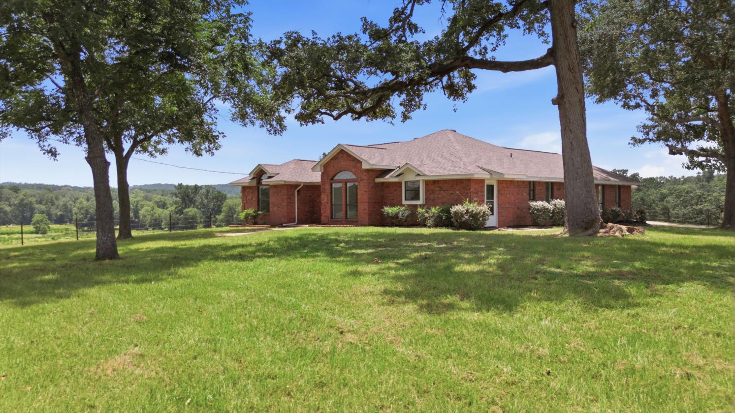 ~66 Acres + Updated Ranch Home + Ponds & Barn! - photo 1