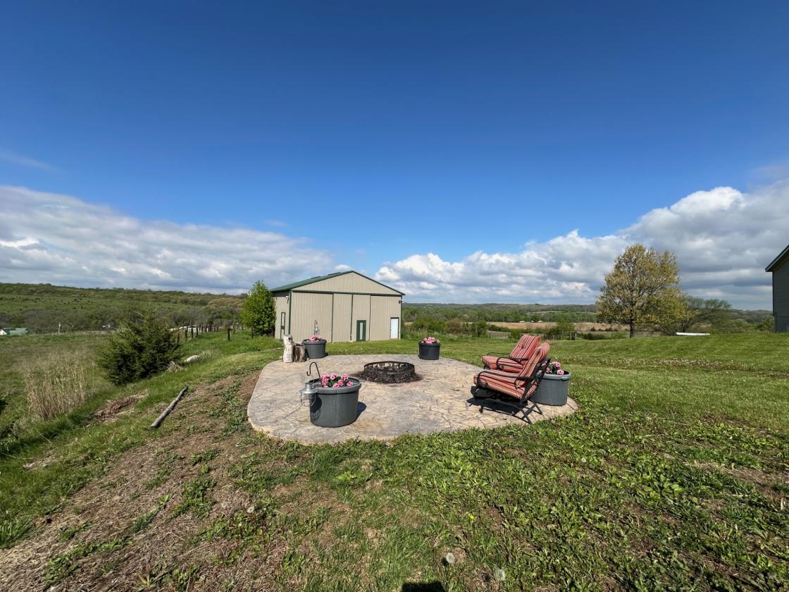 40 acre farm with stunning hilltop views! - photo 2