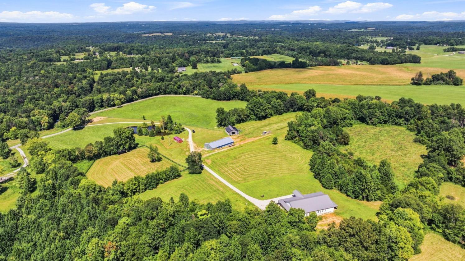 Multigenerational Home with 32 Acres & Horse Barn - photo 10